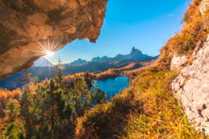 Federa lake in autumn framed in a rock window, Croda da Lago, Dolomites, Cortina d Ampezzo, Belluno, Veneto, Italy Federa lake in autumn framed in a rock window, Croda da Lago, Dolomites, Cortina d Ampezzo, Belluno, Veneto, Italy